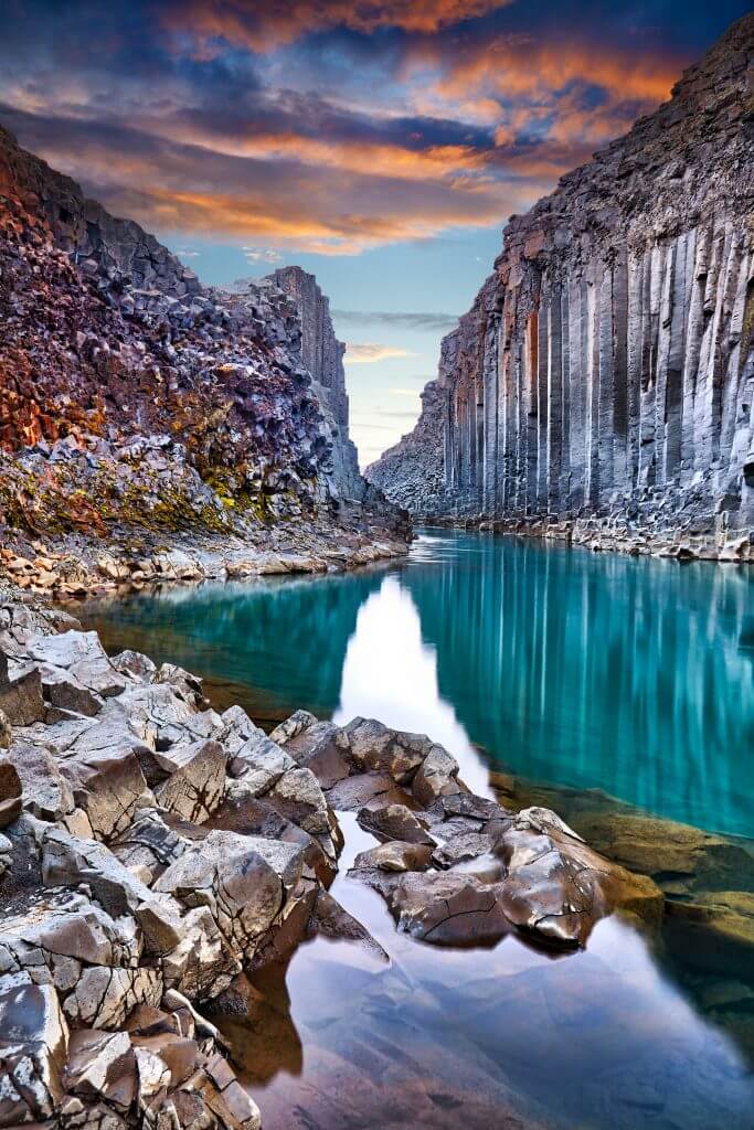 hidden river in rock canyon, iceland